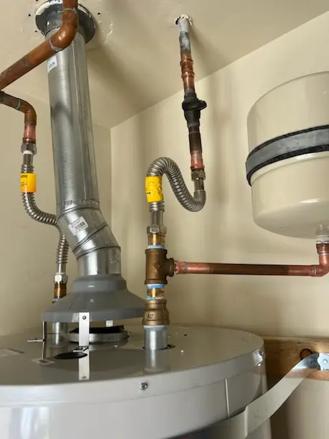 Water heater installation and plumbing repair in Lamplight Village